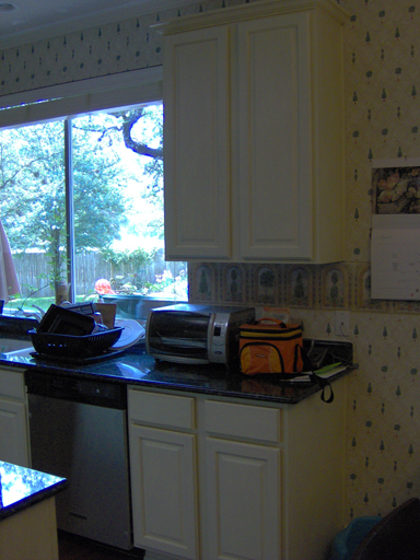 Painted and antiqued kitchen cabinets