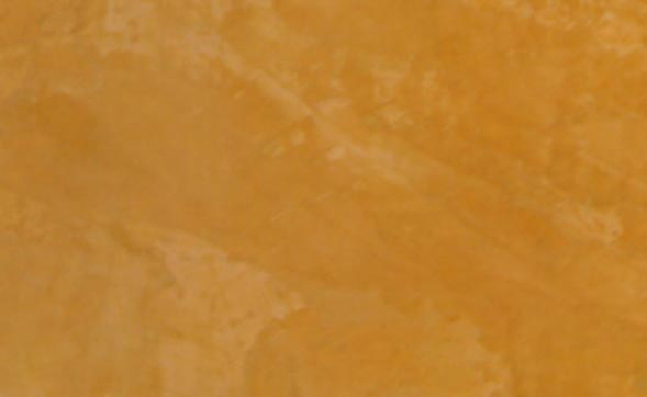 Close-up of a Venetian Plaster faux finish in a Behr color called Pompeii.